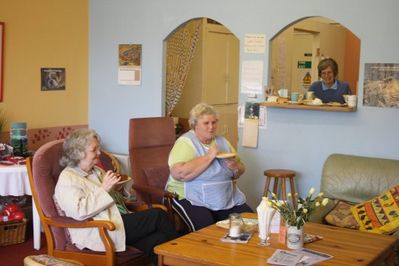 Oasis Coffee Shop volunteer assistants taking a break
